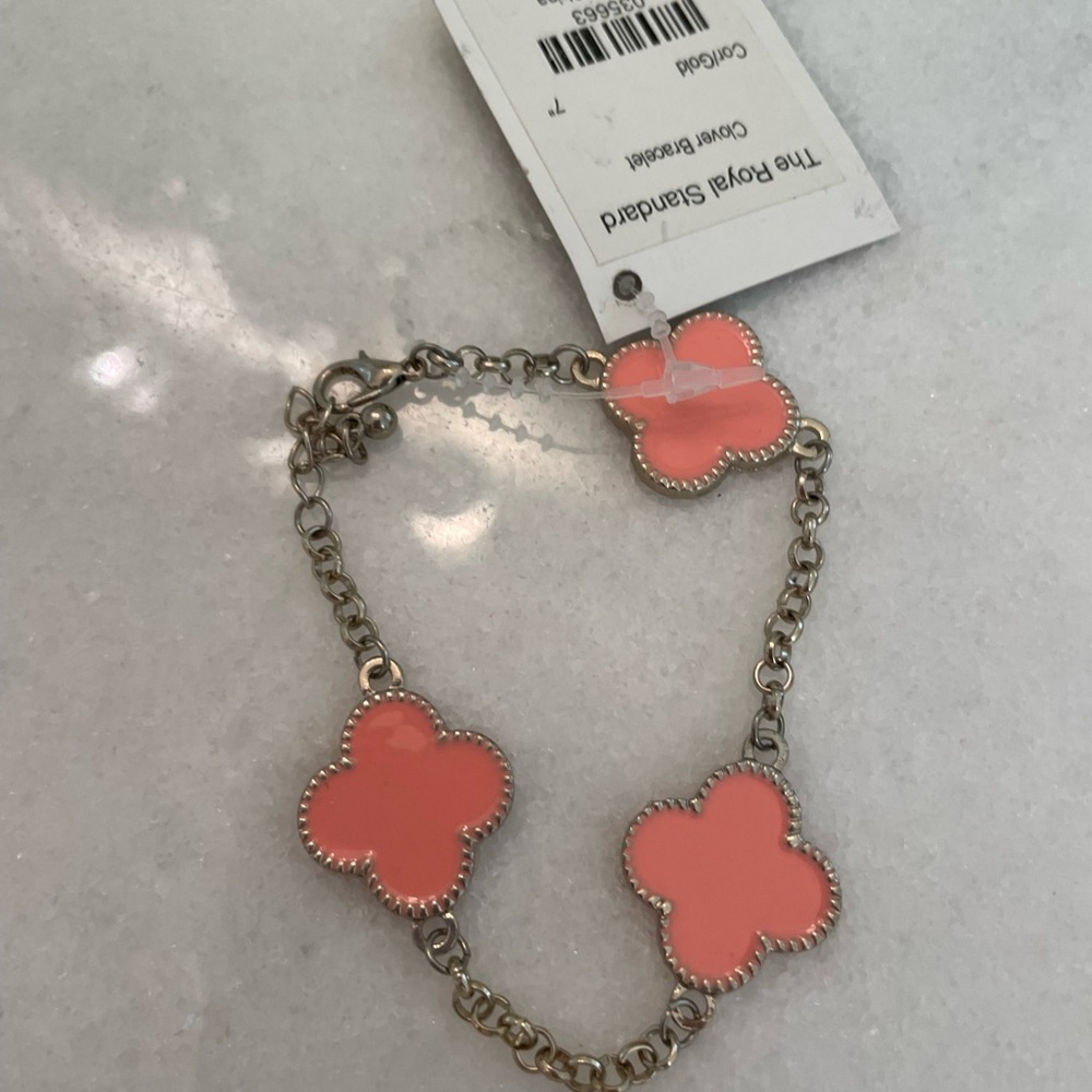 Royal Standard silver bracelet with peach colored enamel design.